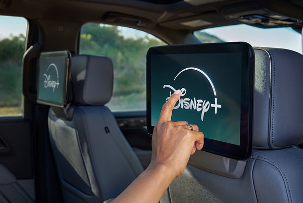Disney+ being watched  on the rear seat entertainment system