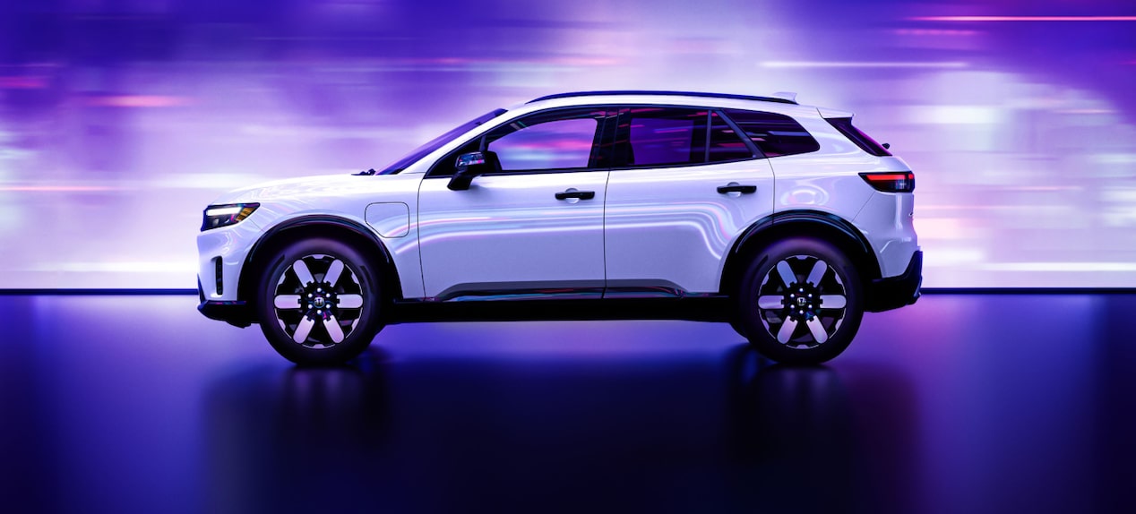 Un véhicule Honda avec un éclairage violet et blanc