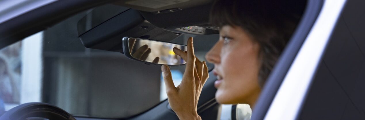 Woman using Essential OnStar plan.