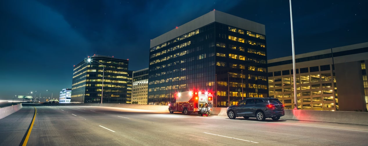 OnStar Emergency Services during an emergency at night in the city.