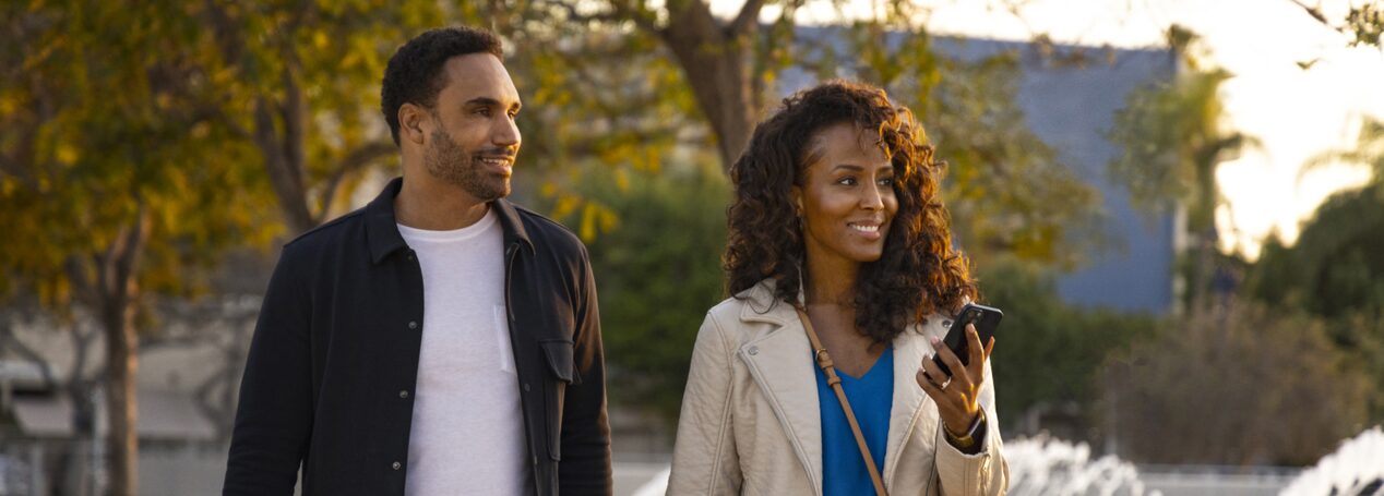 A couple getting started with the OnStar app.