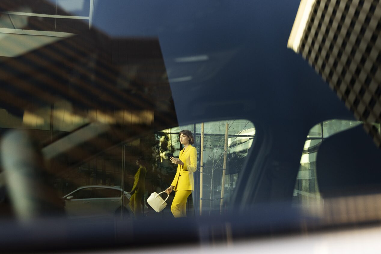 Woman using her vehicle mobile app.