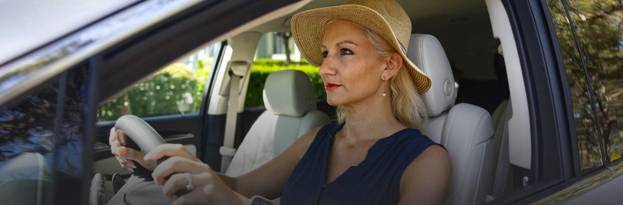 OnStar member Maura R. driving a car.