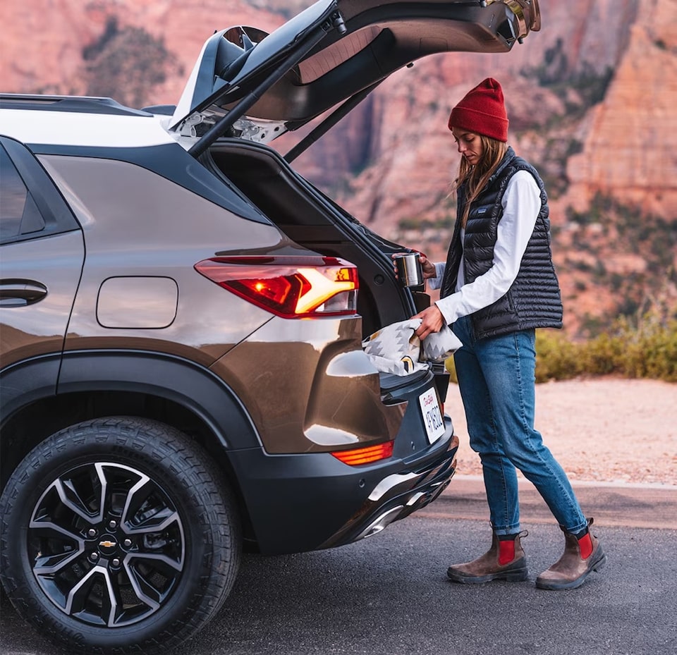 A woman packing for her Stargazing adventure.