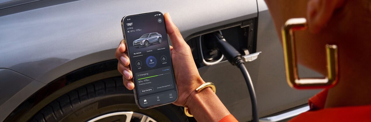 Person using her OnStar subscription on a mobile phone.