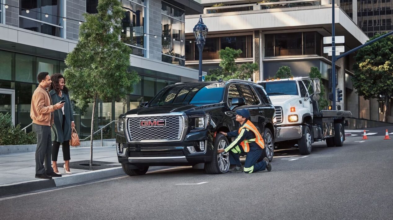 GMC vehicle tire being fixed by OnStar.