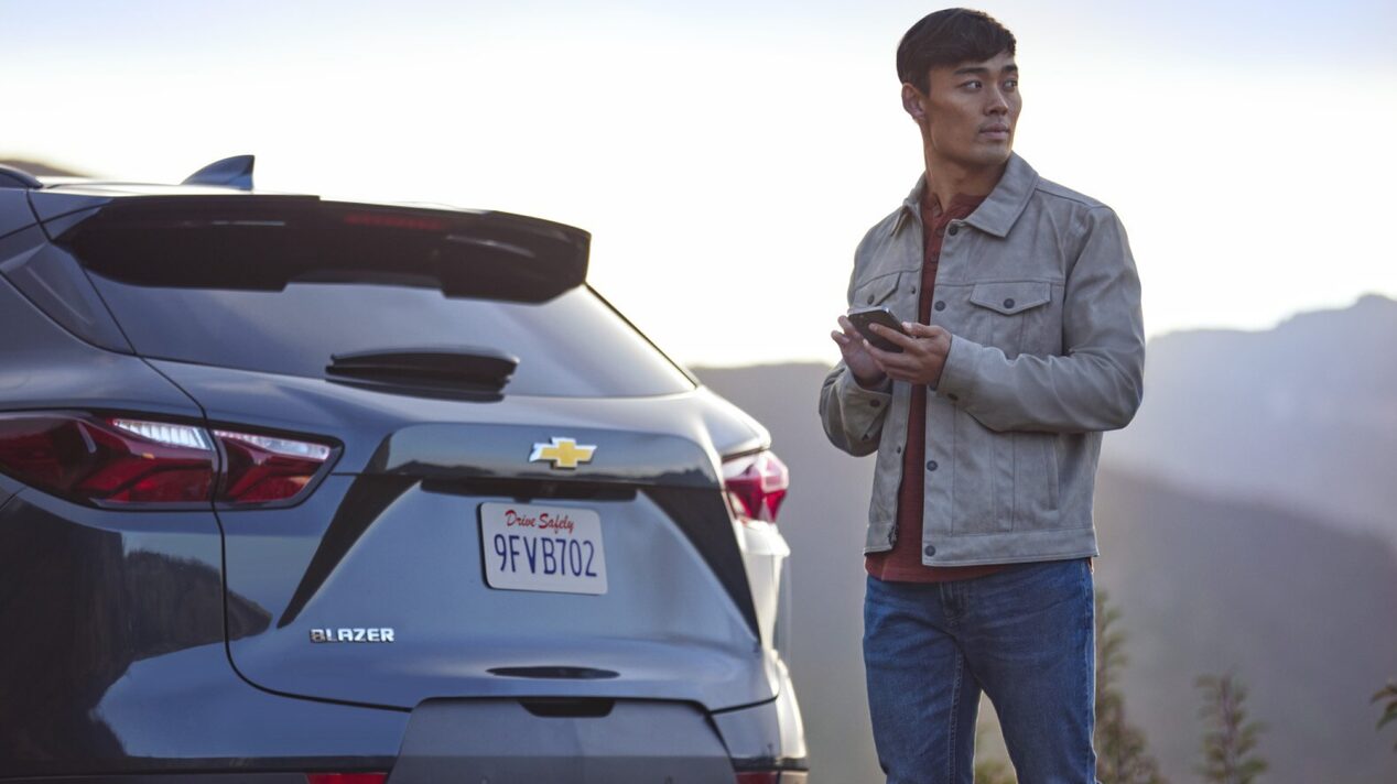 Utilizing the OnStar app for its service while on-the-go.
